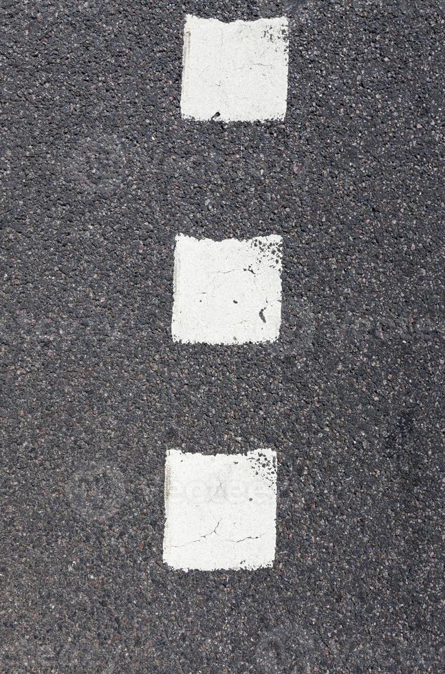 carretera pavimentada, un primer plano de una parte de la calzada de una carretera asfaltada foto