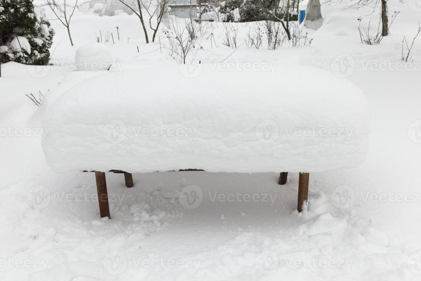 objects covered with a thick layer of snow photo