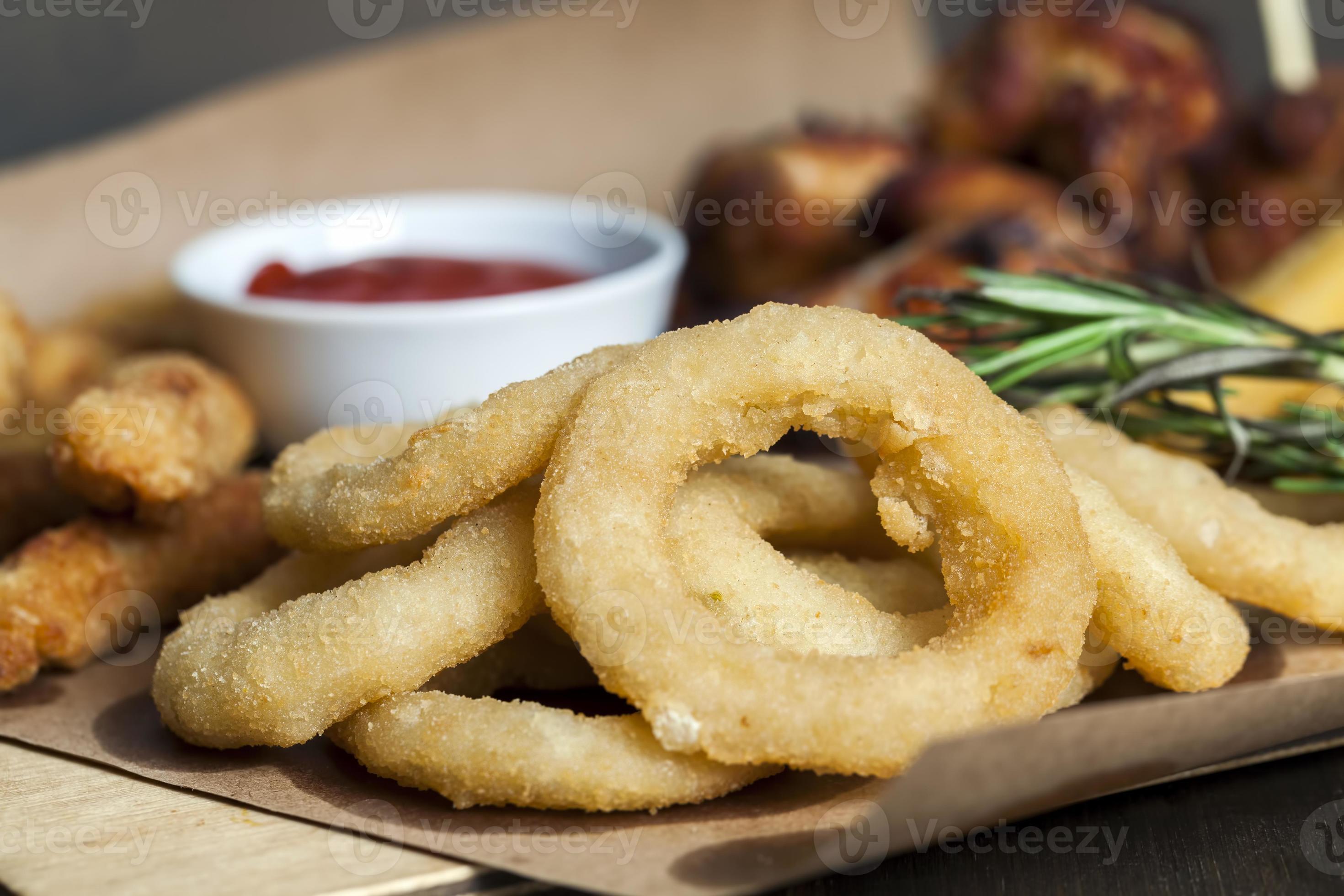 deep fry onion rings are used as a side dish or snack 9441094 Stock