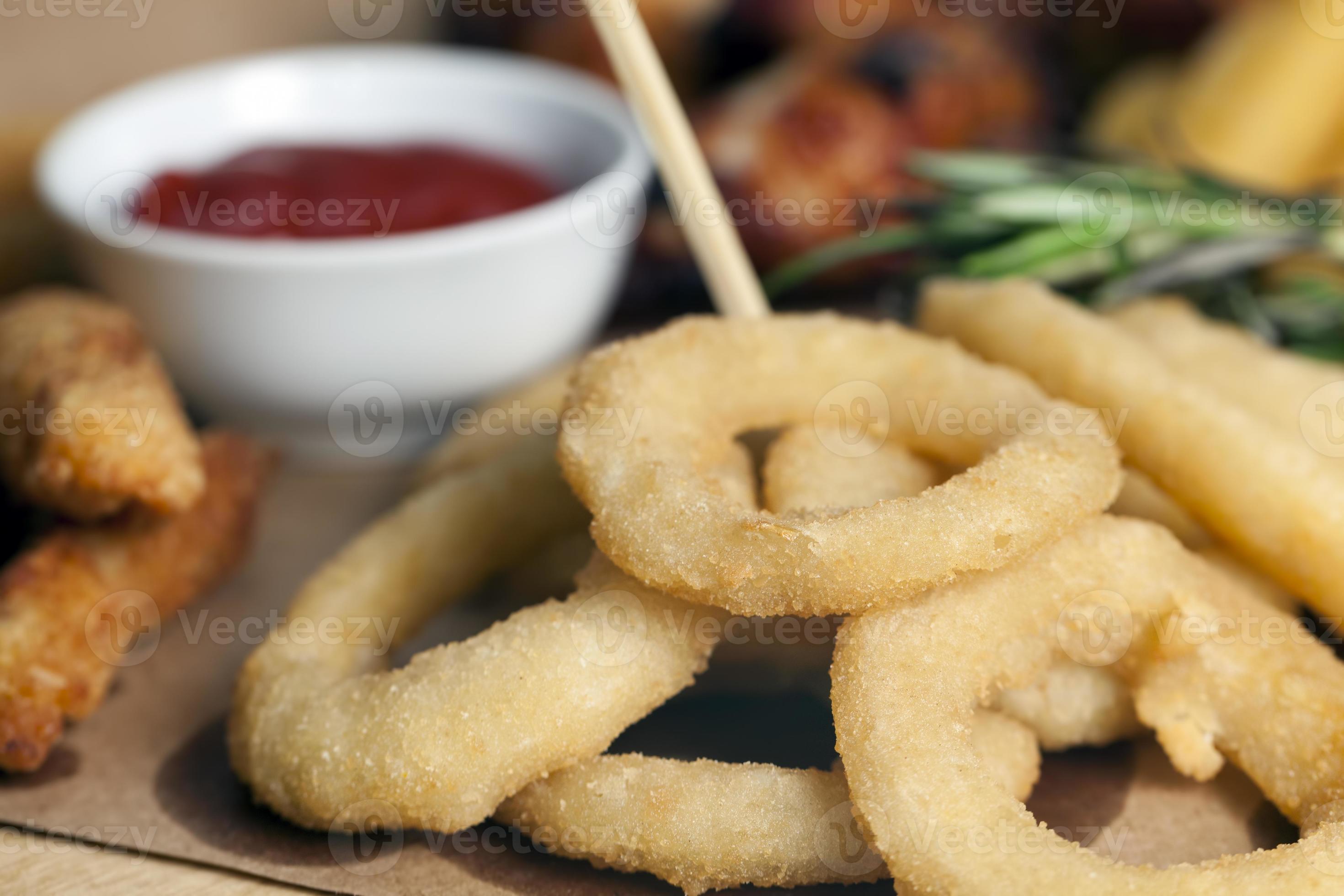 deep fry onion rings are used as a side dish or snack 9441763 Stock
