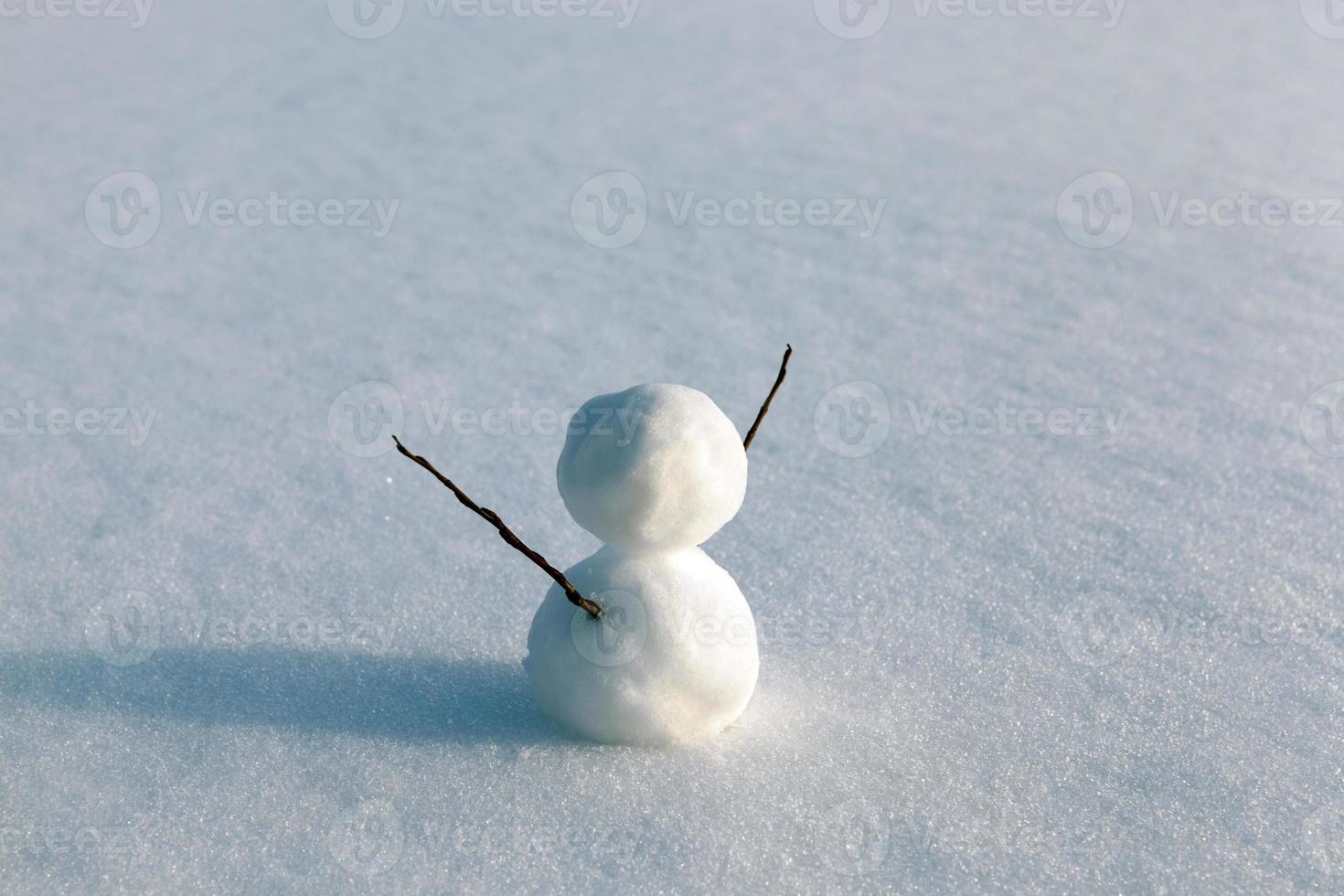 snowmen made of snow in winter photo