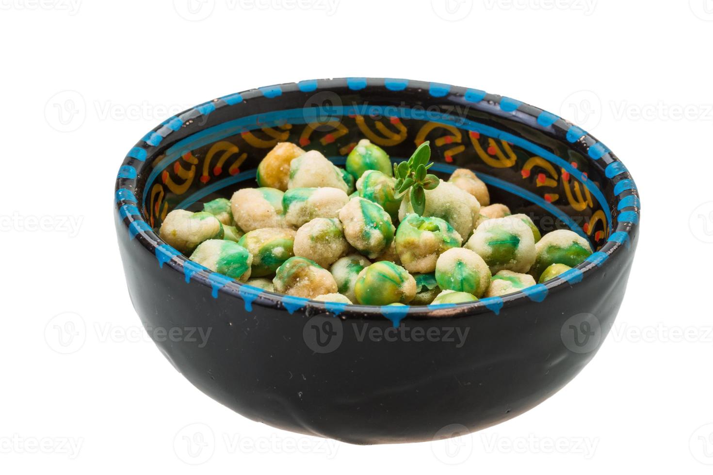 Crispy green peas in a bowl on white background photo
