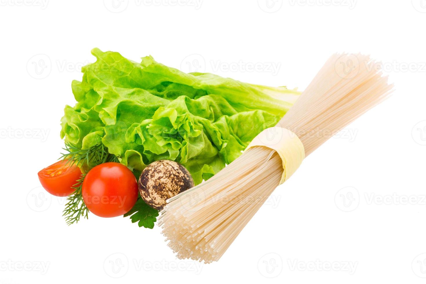 Raw rice noodles on white background photo