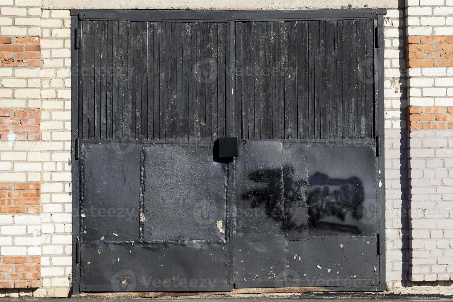 old gates made of wood and metal photo