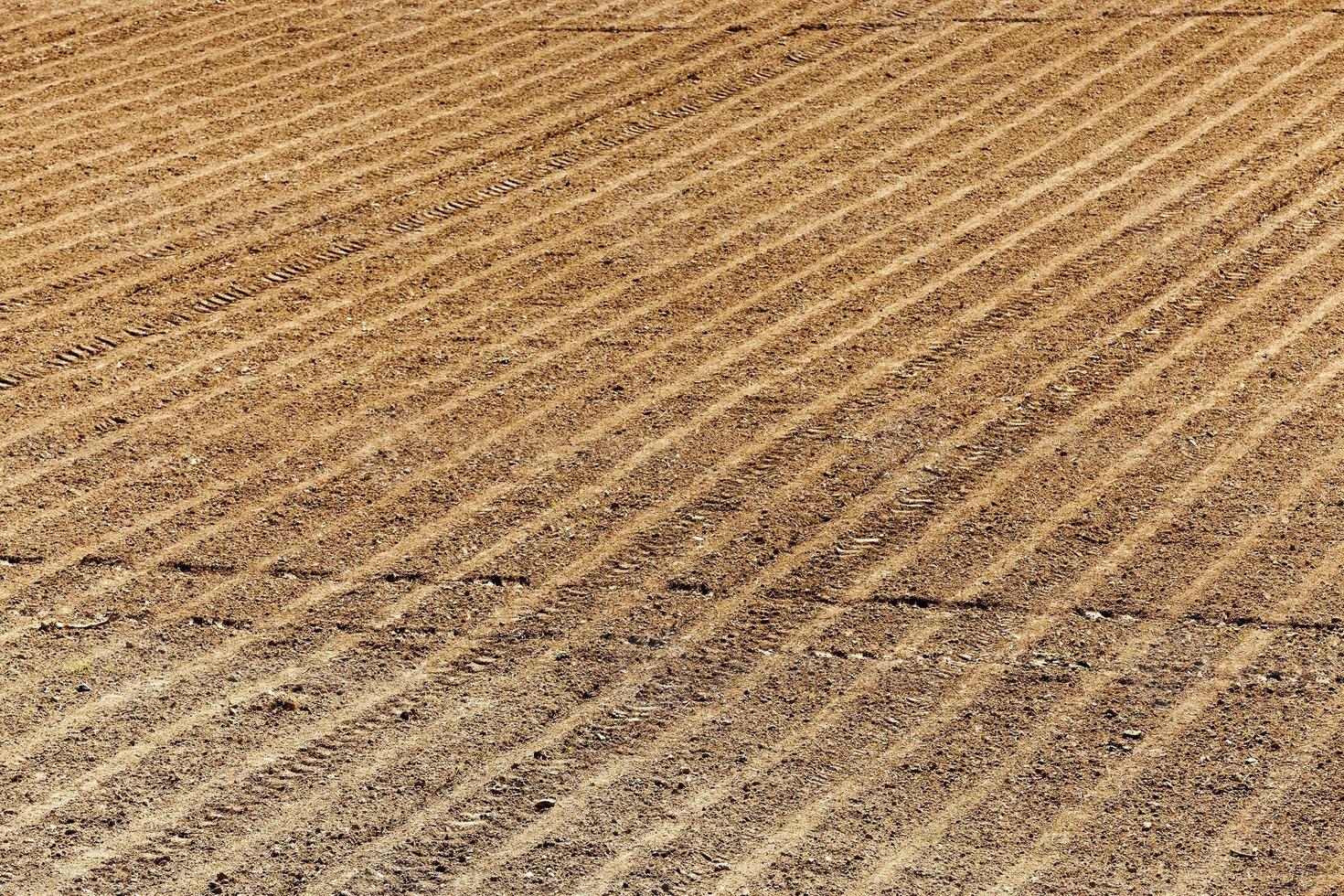 plowed agricultural field photo