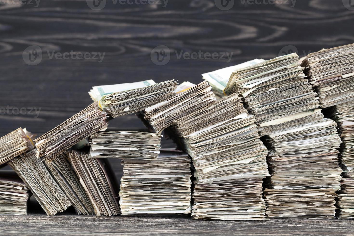 a large amount of old crumpled and dirty money photo