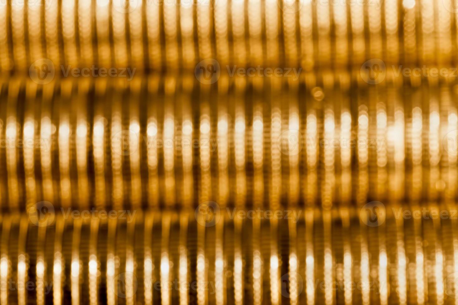 round shaped metal money stacked in a pile photo