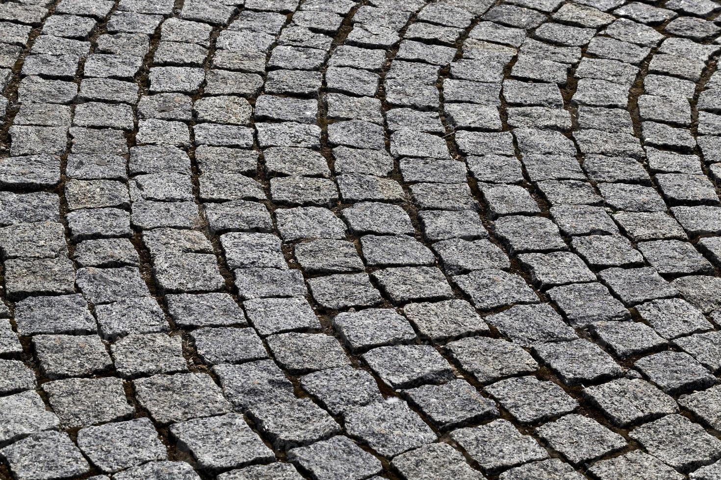 cobblestones road , close up photo