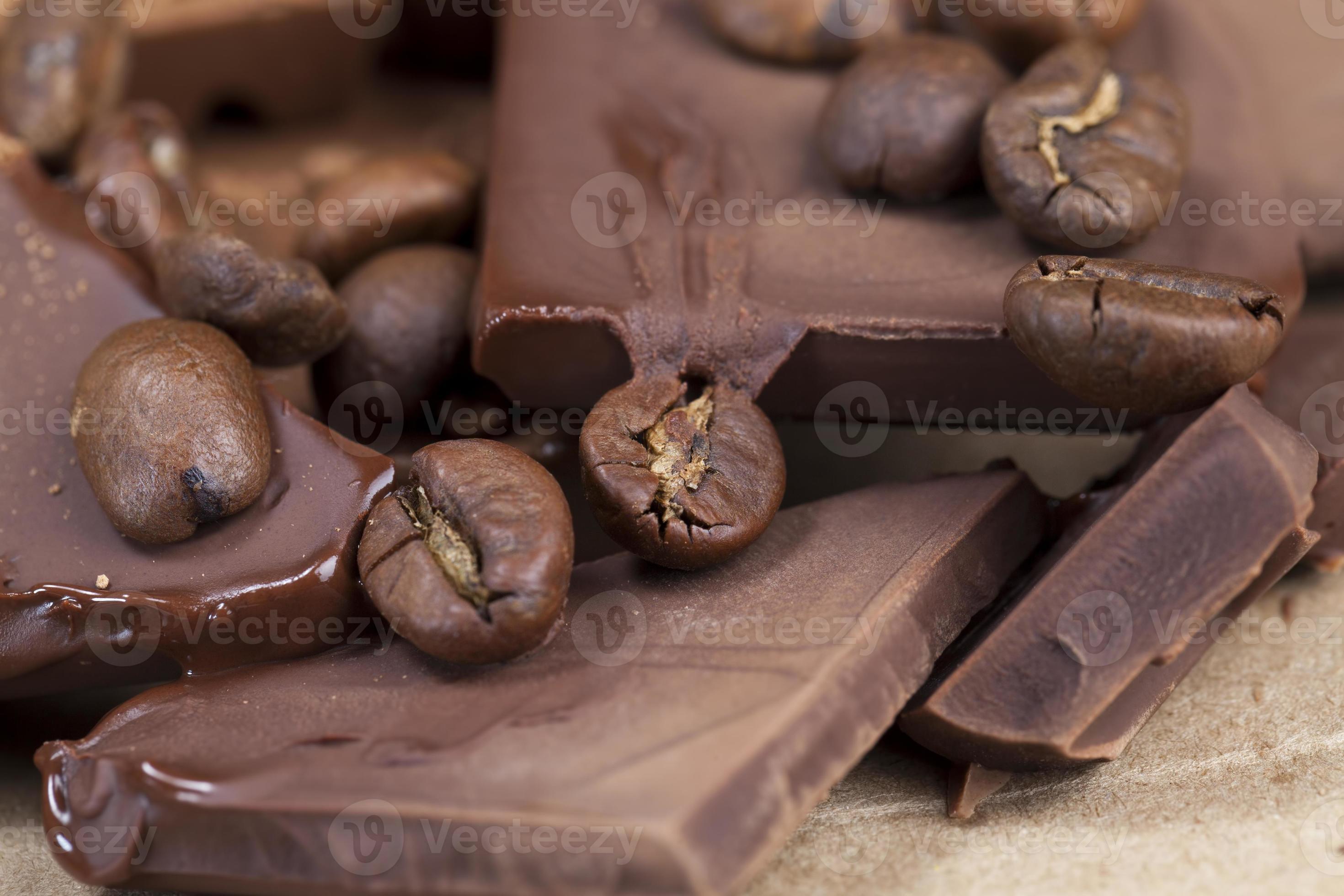 chocolate bar with cocoa powder topping and coffee beans 9450028 Stock