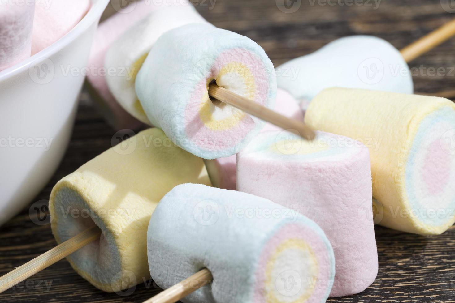 multi colored sweet soft marshmallows made from sugar photo