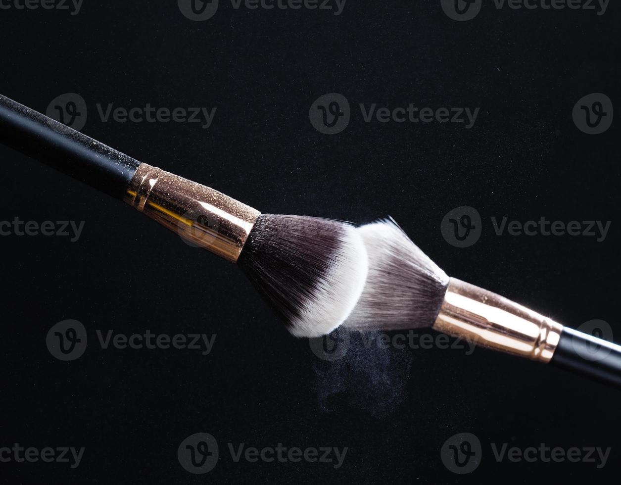 professional cosmetic brush with cosmetic product photo