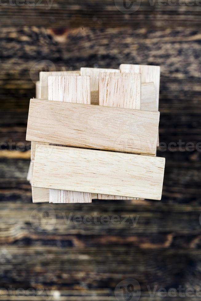 wooden bars with which you can play table games photo