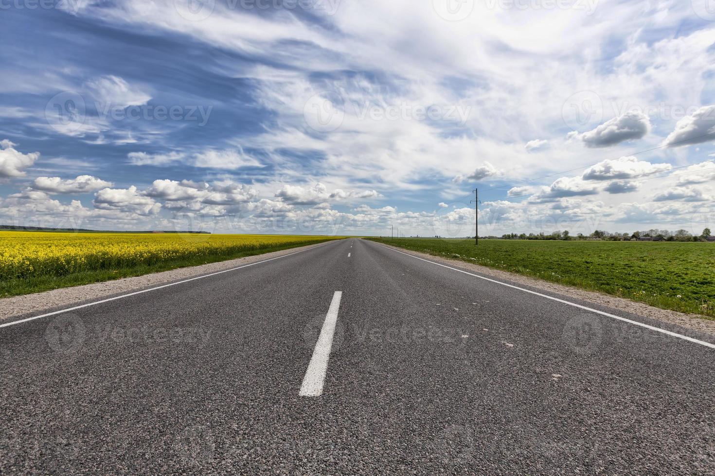 paved road and sky photo