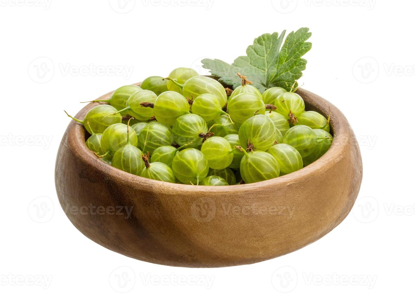 Gooseberry in a bowl on white background photo