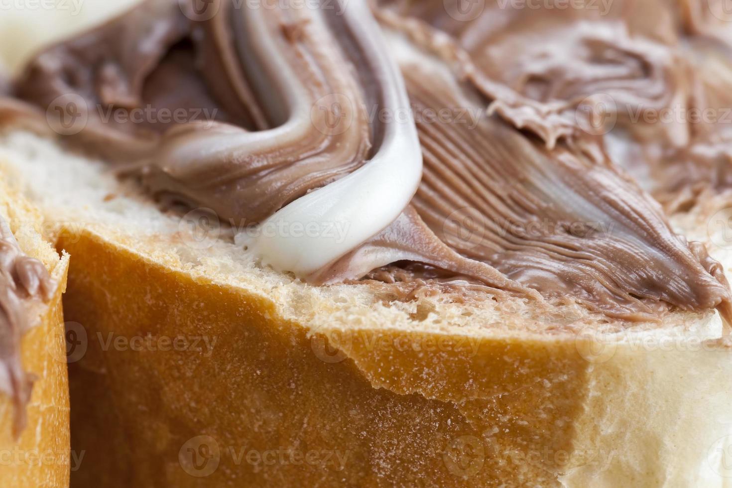 natural cocoa chocolate paste during Breakfast, white bread photo