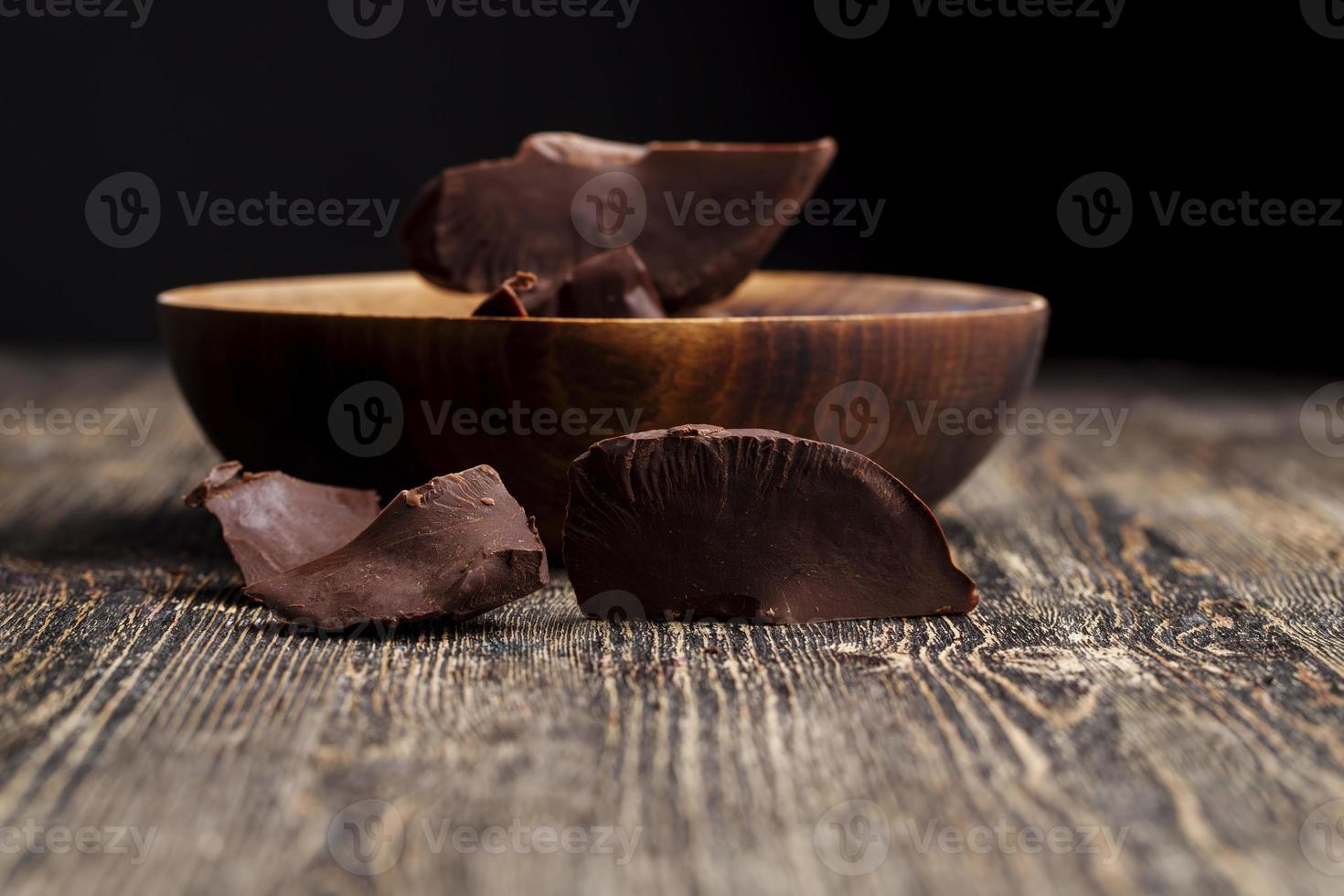 large chunks of chocolate with cocoa photo