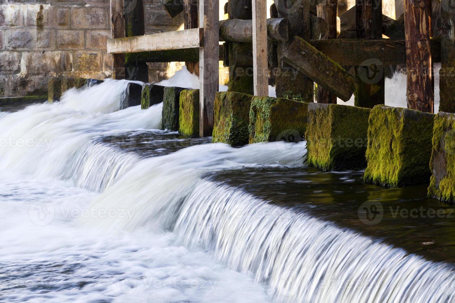 the lower part of a small dam photo