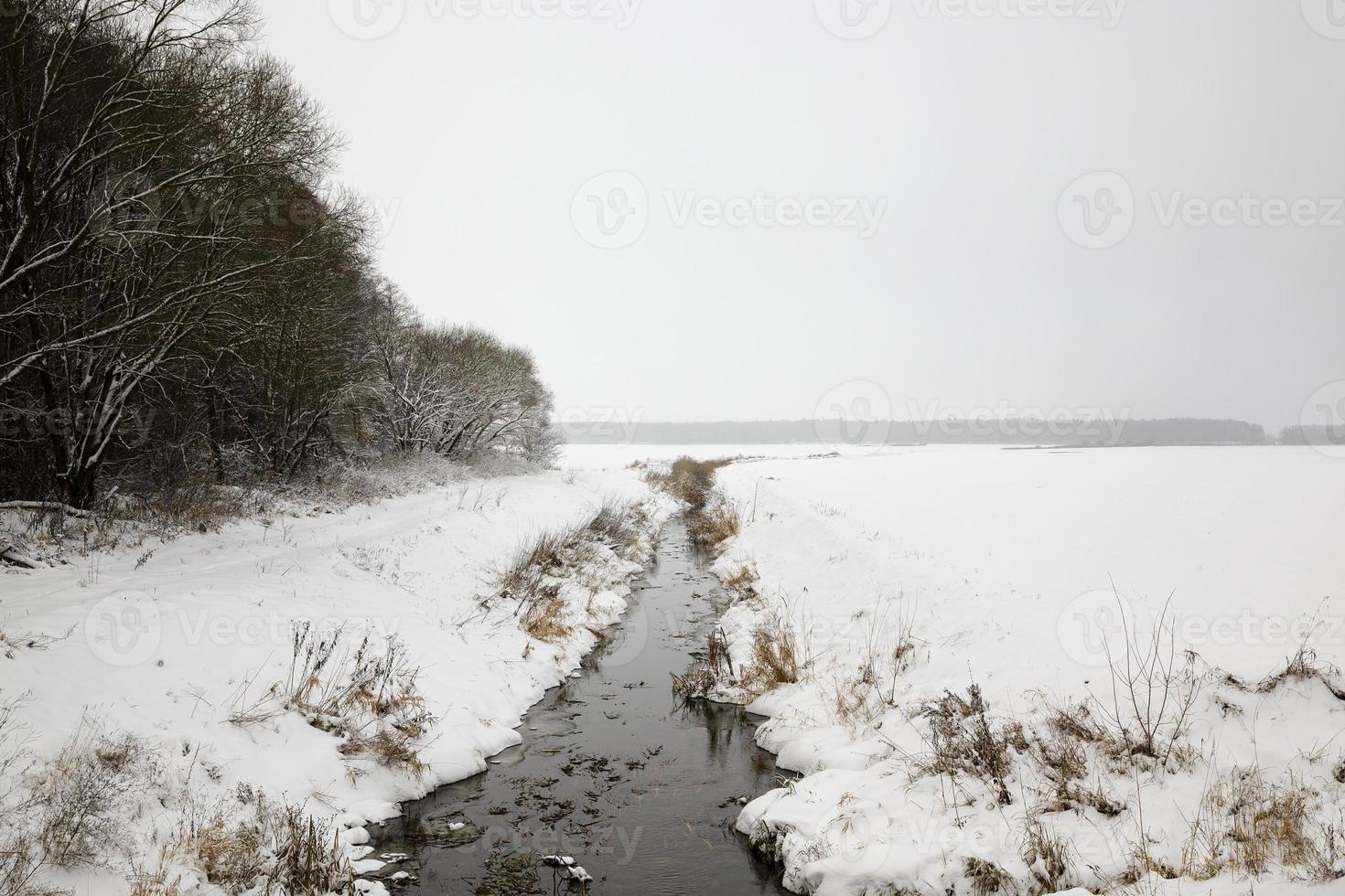 snow covered river photo