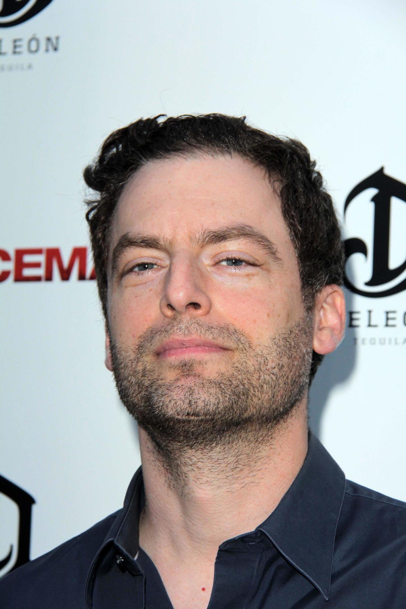 LOS ANGELES, APR 22 Justin Kirk arrives at The Iceman Premiere at the