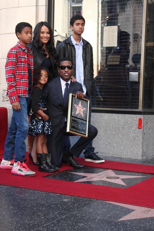 LOS ANGELES, OCT 10 -  Kenny Babyface Edmonds, Children, Fiance at the Kenny Babyface Edmonds Hollywood Walk of Fame Star Ceremony at Hollywood Boulevard on October 10, 2013 in Los Angeles, CA photo