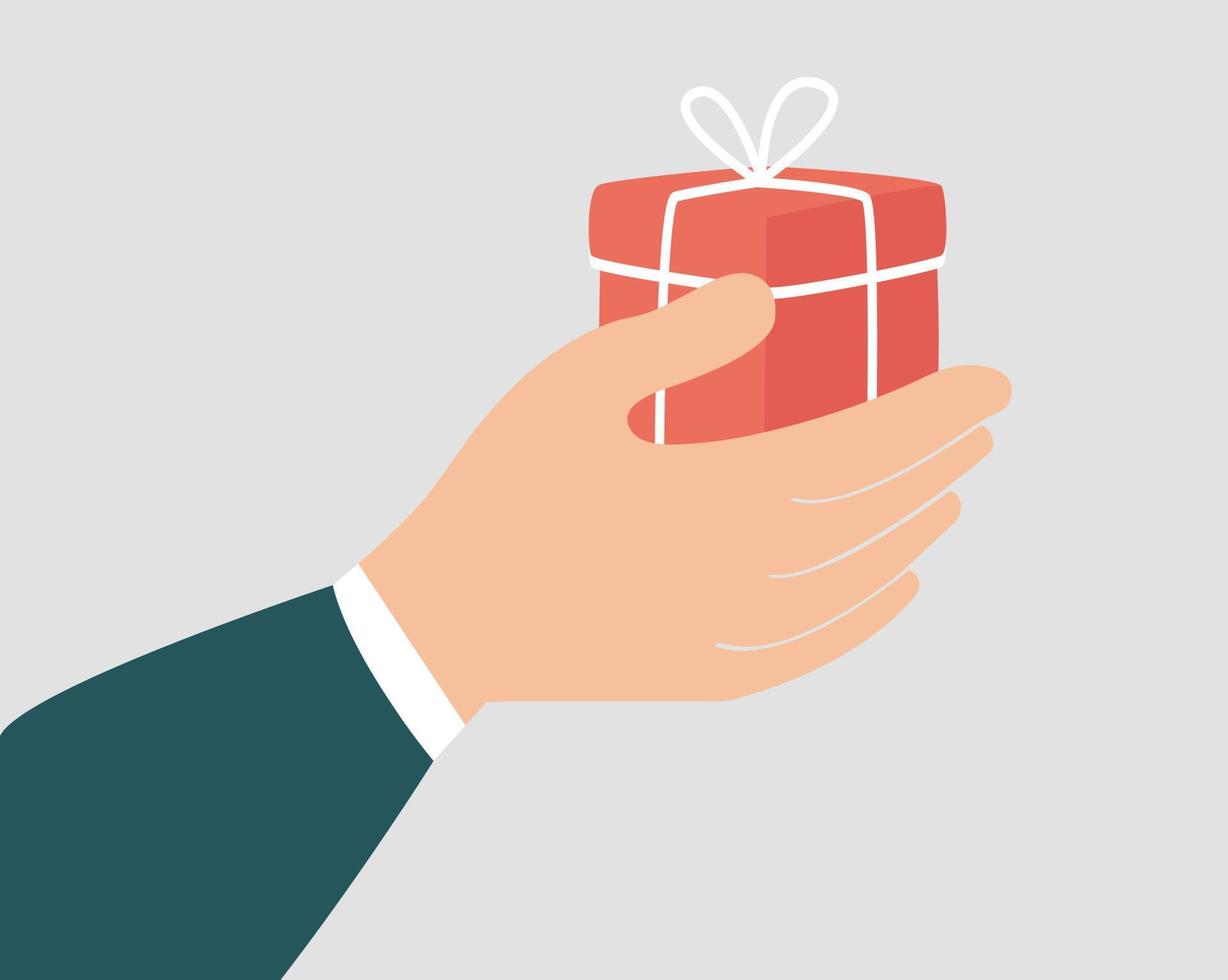 Gift box to celebrate birthday or anniversary. A hand of a woman or a man holding a surprise gift as a sign of love. Concept of Christmas celebration, philanthropy and charity. Vector illustration