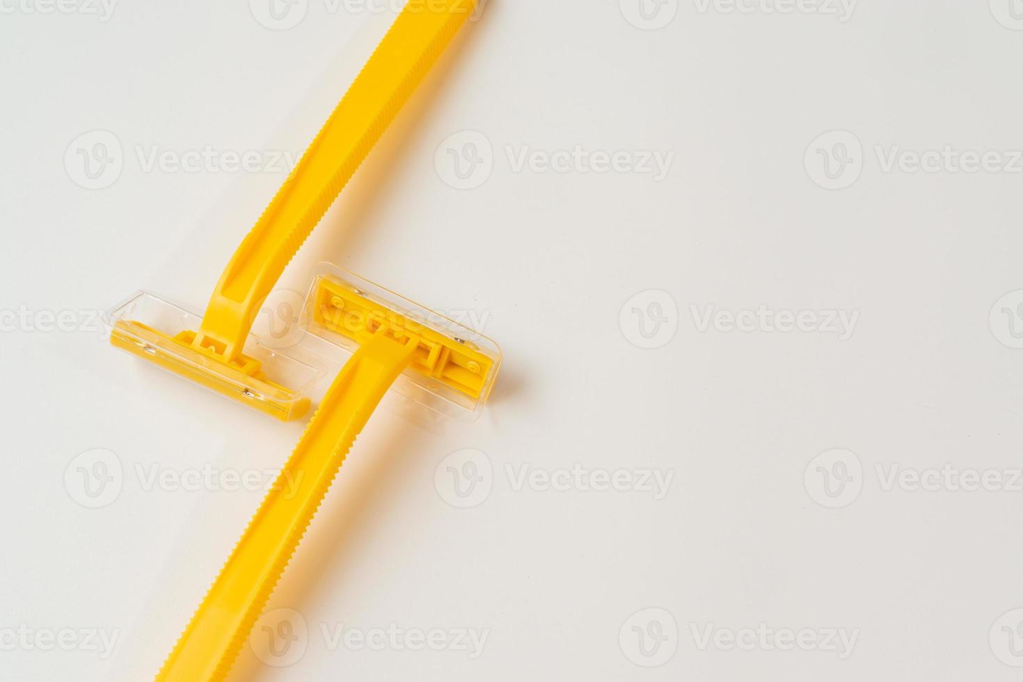 Disposable shaver isolated on white background. photo