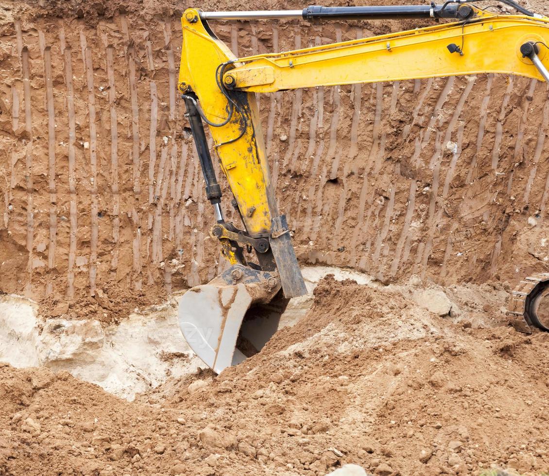 part of a tractor with a bucket 9487755 Stock Photo at Vecteezy