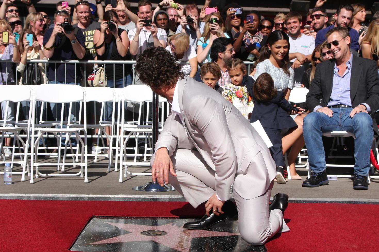 LOS ANGELES, NOV 17 - Matthew McConaughey, family in background at the Matthew McConaughey Hollywood Walk of Fame Star Ceremony at the Hollywood and Highland on November 17, 2014 in Los Angeles, CA photo