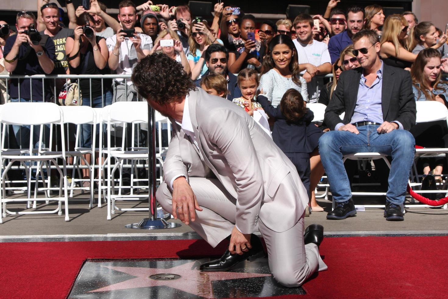 LOS ANGELES, NOV 17 - Matthew McConaughey, family in background at the Matthew McConaughey Hollywood Walk of Fame Star Ceremony at the Hollywood and Highland on November 17, 2014 in Los Angeles, CA photo