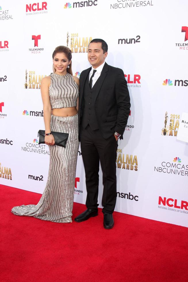 LOS ANGELES, OCT 10 - Josephine Ochoa, Rick Mancia at the ALMA Awards Arrivals 2014 at Civic Auditorium on October 10, 2014 in Pasadena, CA photo