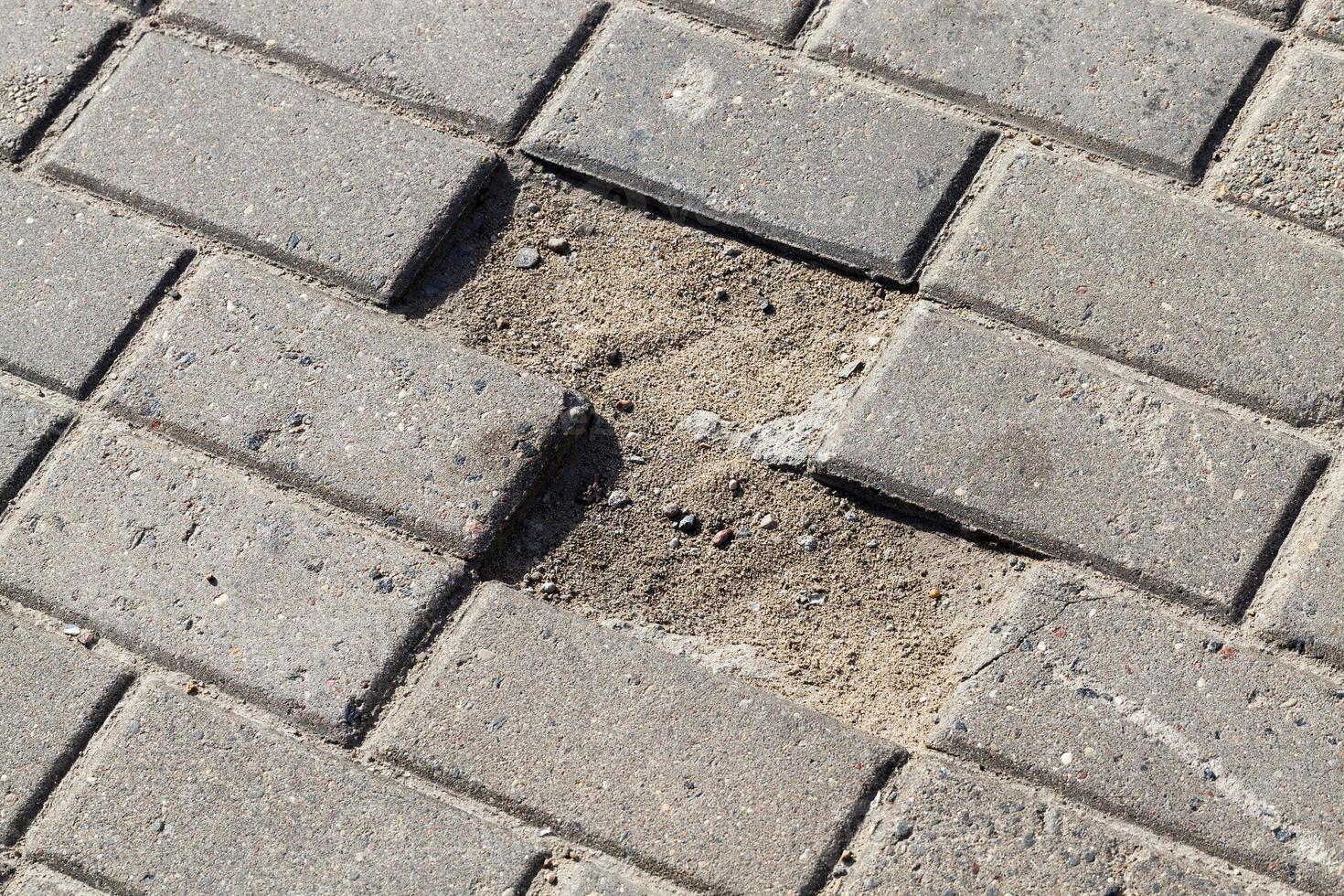 pedestrian tiles broken photo
