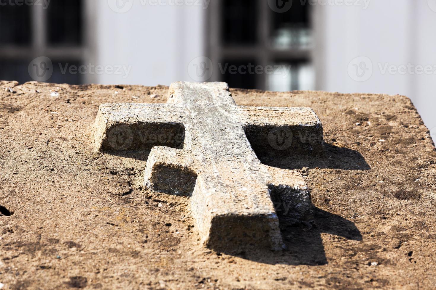 Orthodox stone cross photo
