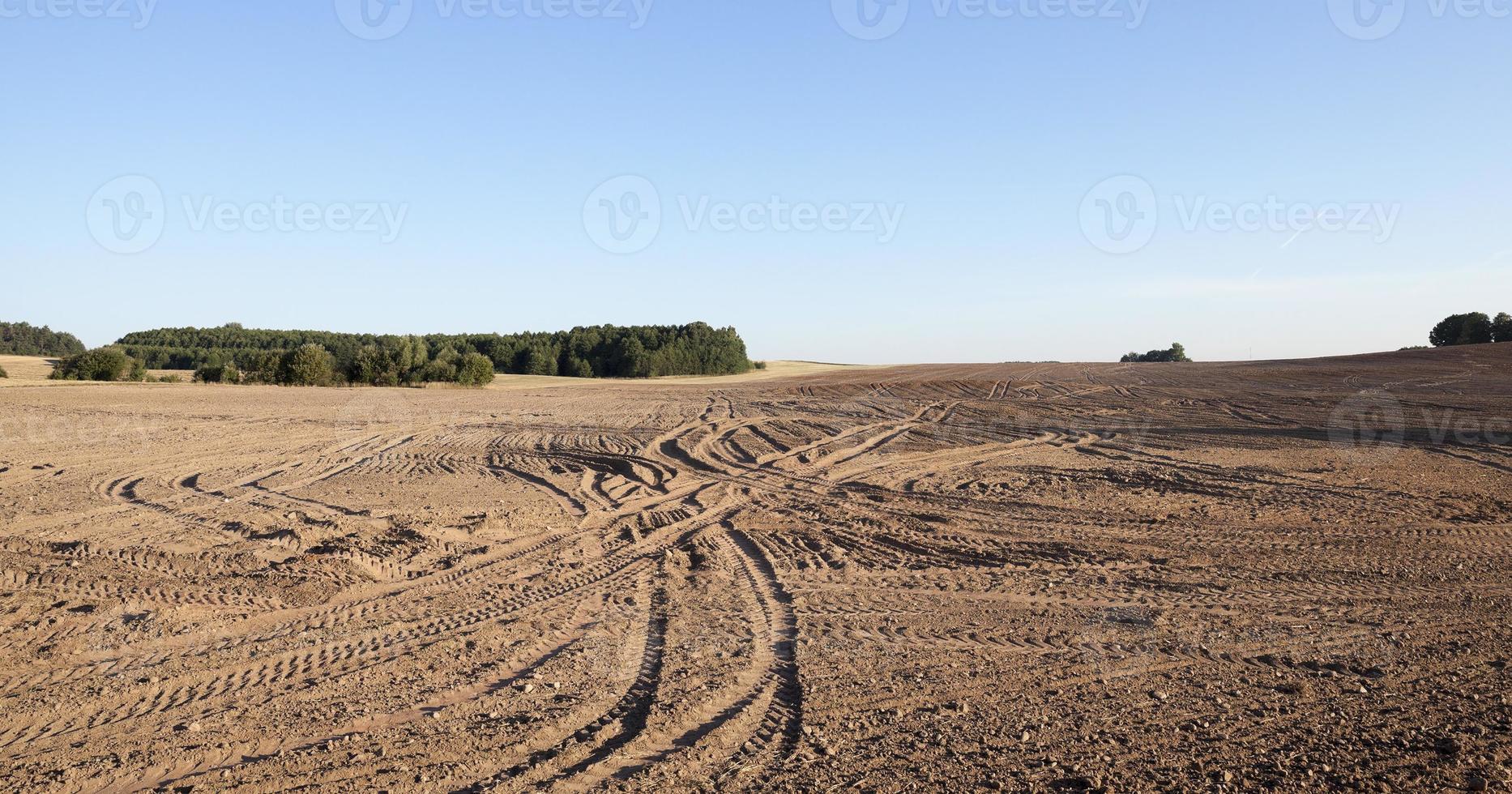 plowed agricultural field photo