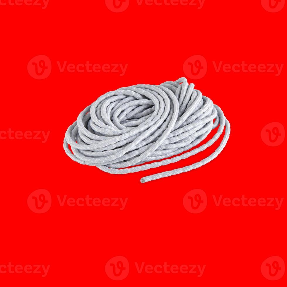 pile of ropes isolated on red background with clipping path photo