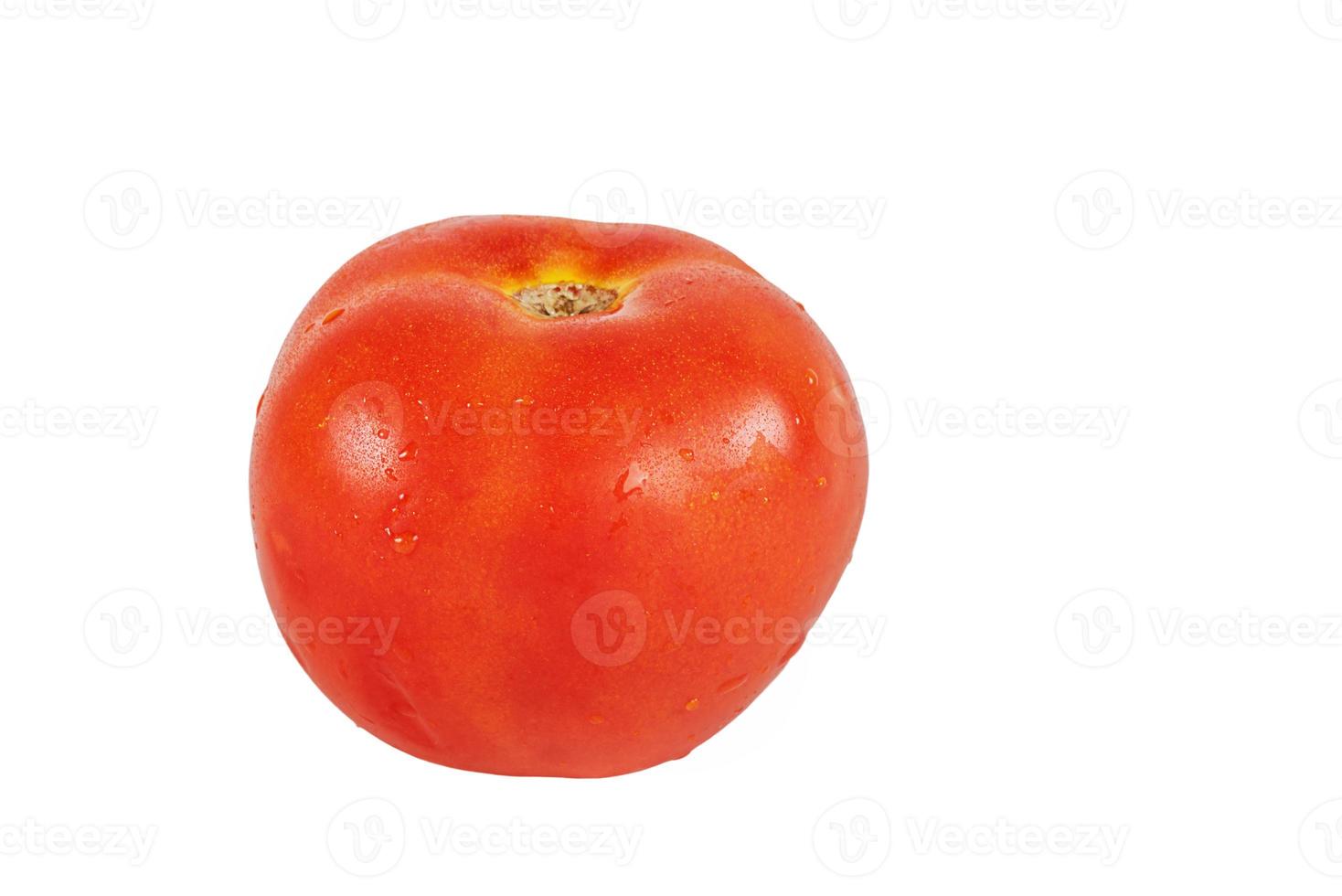 un tomate maduro rojo sobre un fondo blanco. aislado de tomate foto