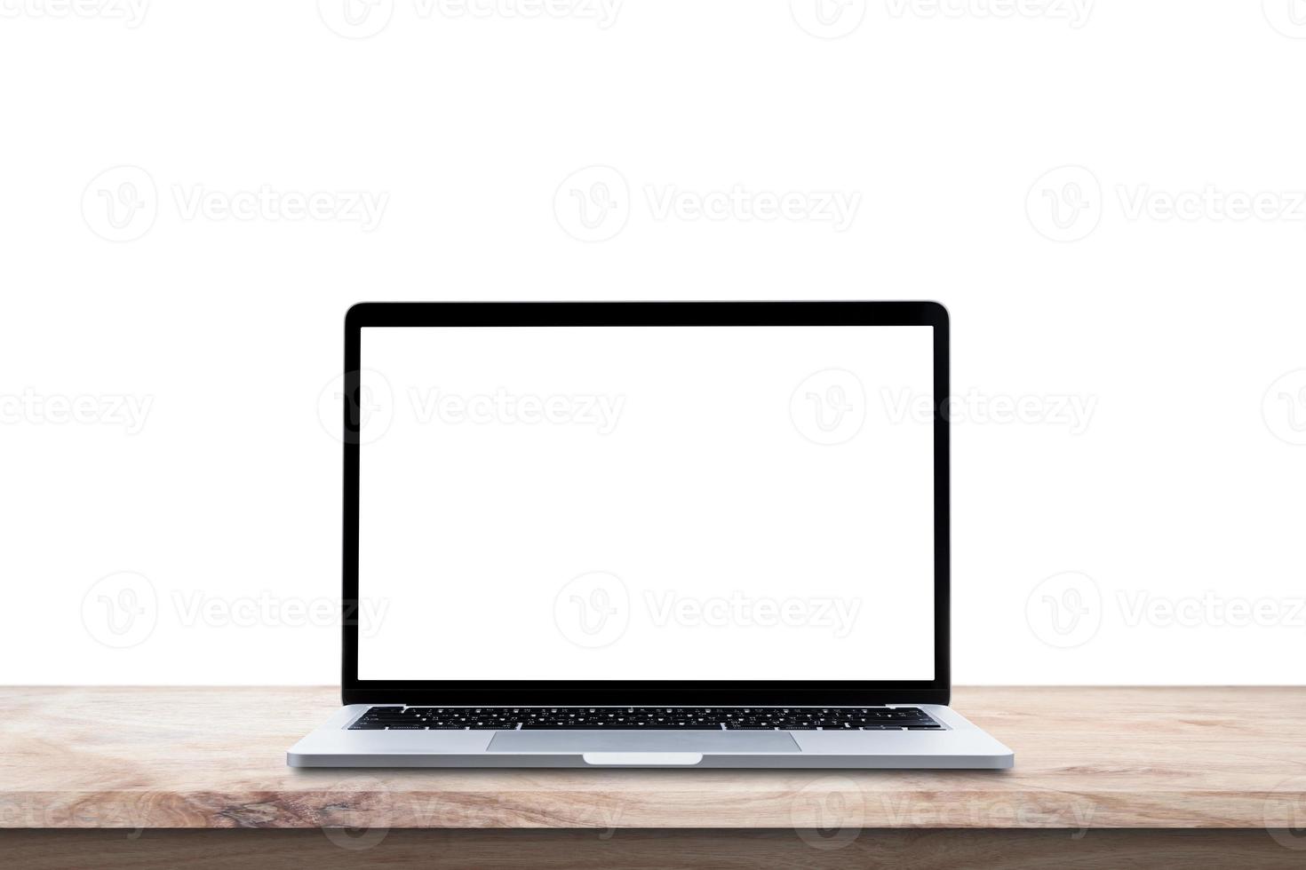 Modern Laptop computer with blank screen on wood table isolated on white background. photo