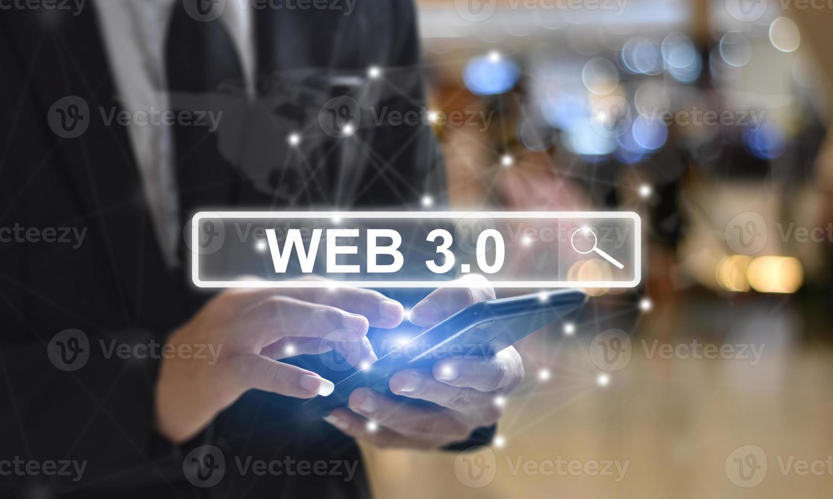 Businessman is using mobile phone pressing on virtual screen and select Web 3.0. Concept of modern technology photo