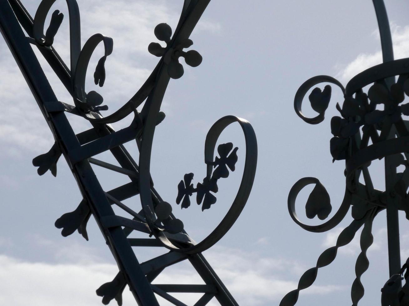 backlit details of a modernist chandelier in the city of Barcelona photo