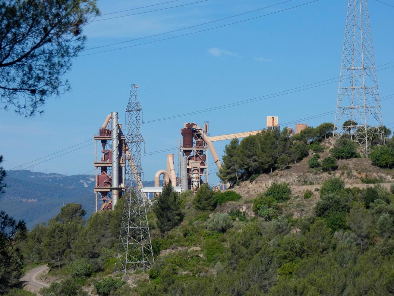 Cement factory with no activity in the vicinity of the city of Barcelona photo