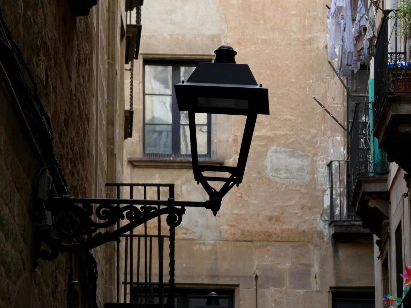 Classic street lamp in the gothic quarter of the city of Barcelona. photo