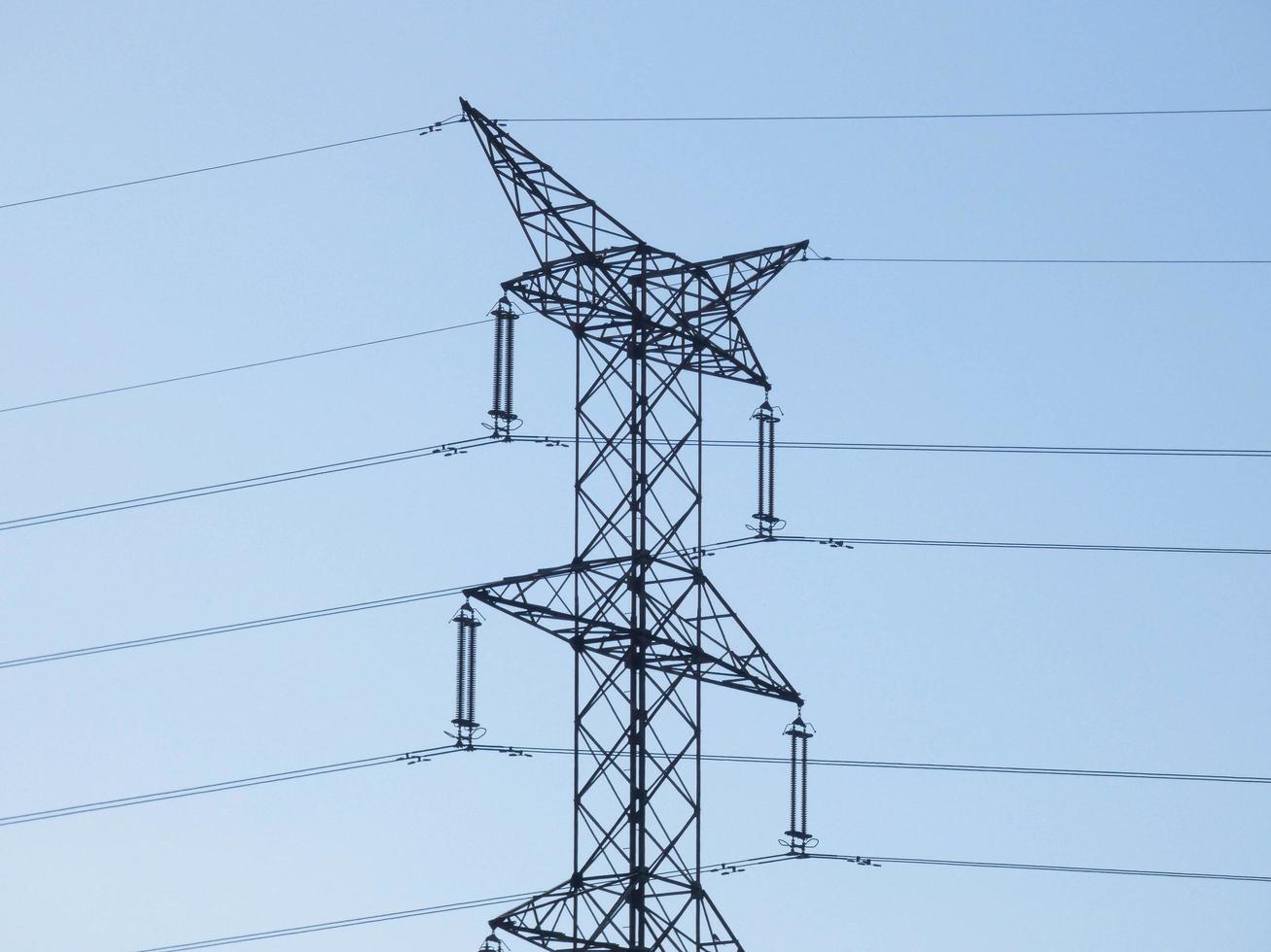 Electric towers in rural areas that bring electricity to our homes photo