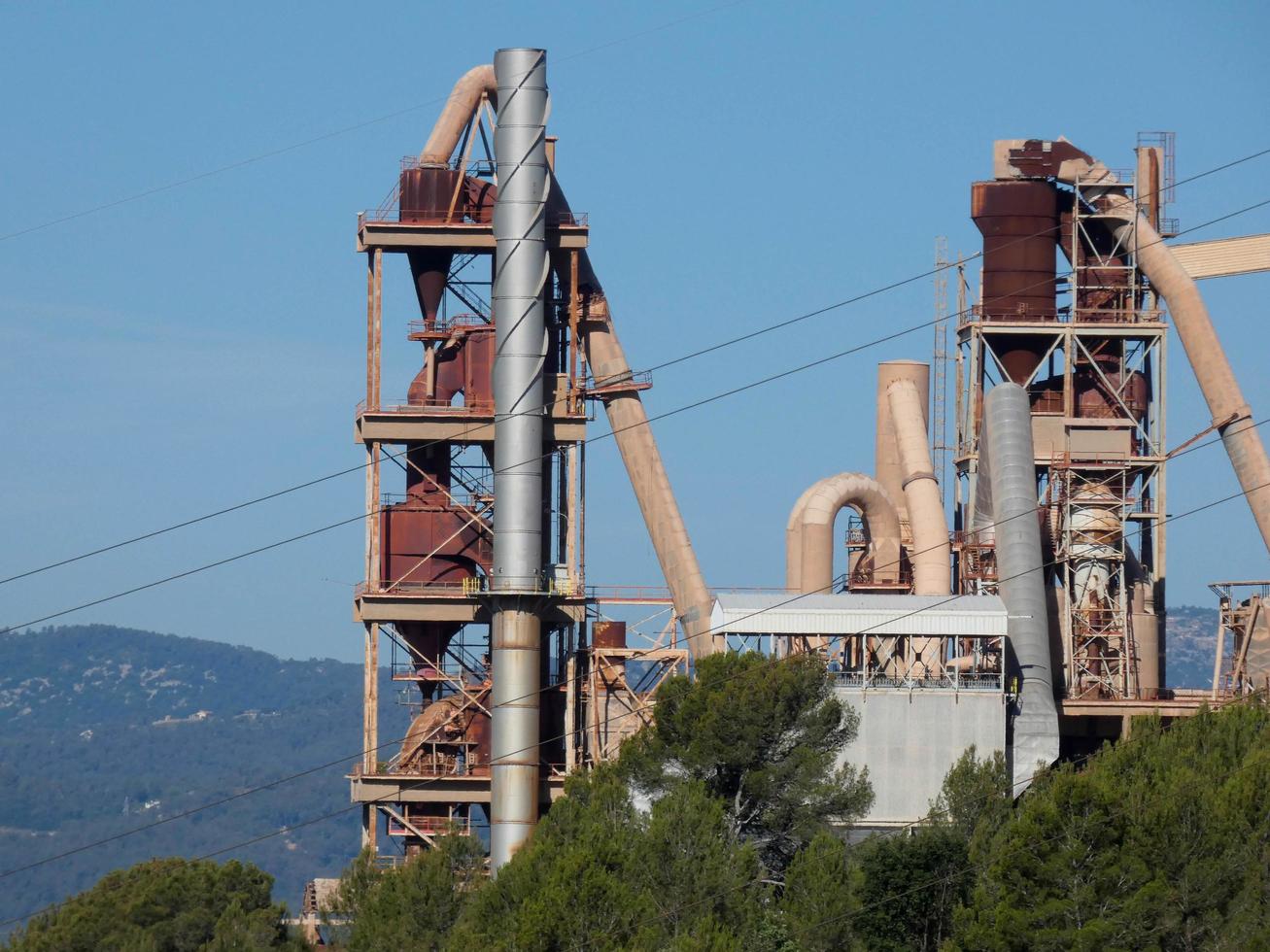 Cement factory with no activity in the vicinity of the city of Barcelona photo