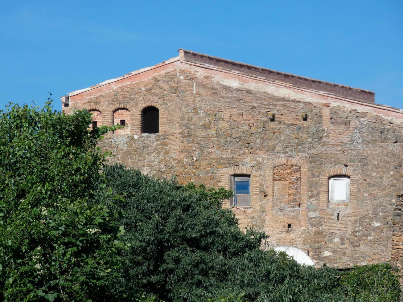 Typical Catalan mountain house in the vicinity of Barcelona, Spain photo