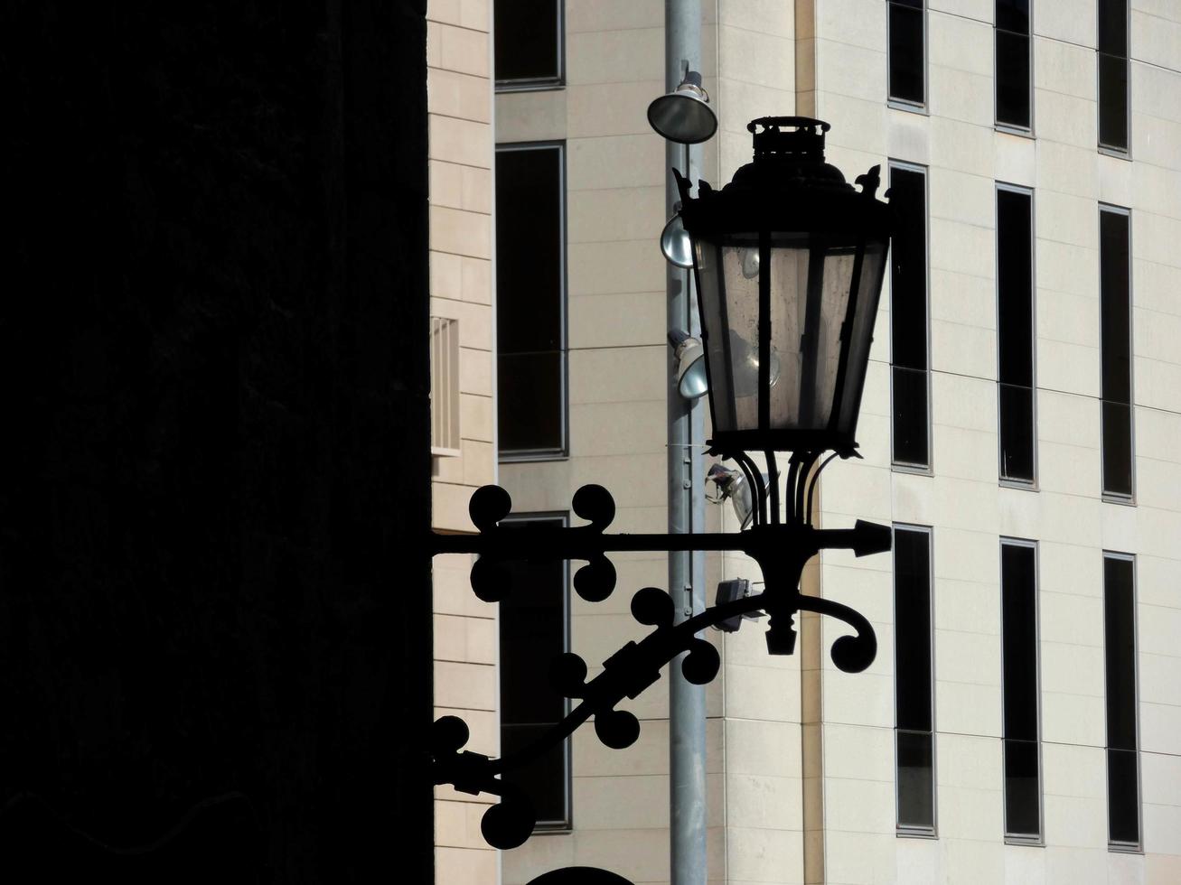 Classic backlit lamp in the gothic quarter of Barcelona, Spain. photo