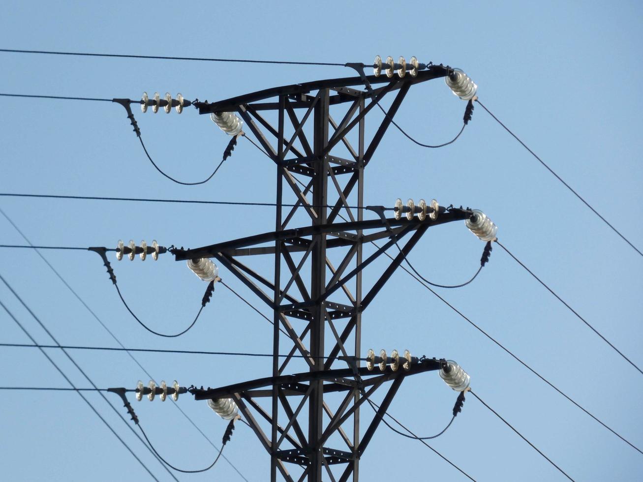 Electric towers in rural areas that bring electricity to our homes photo