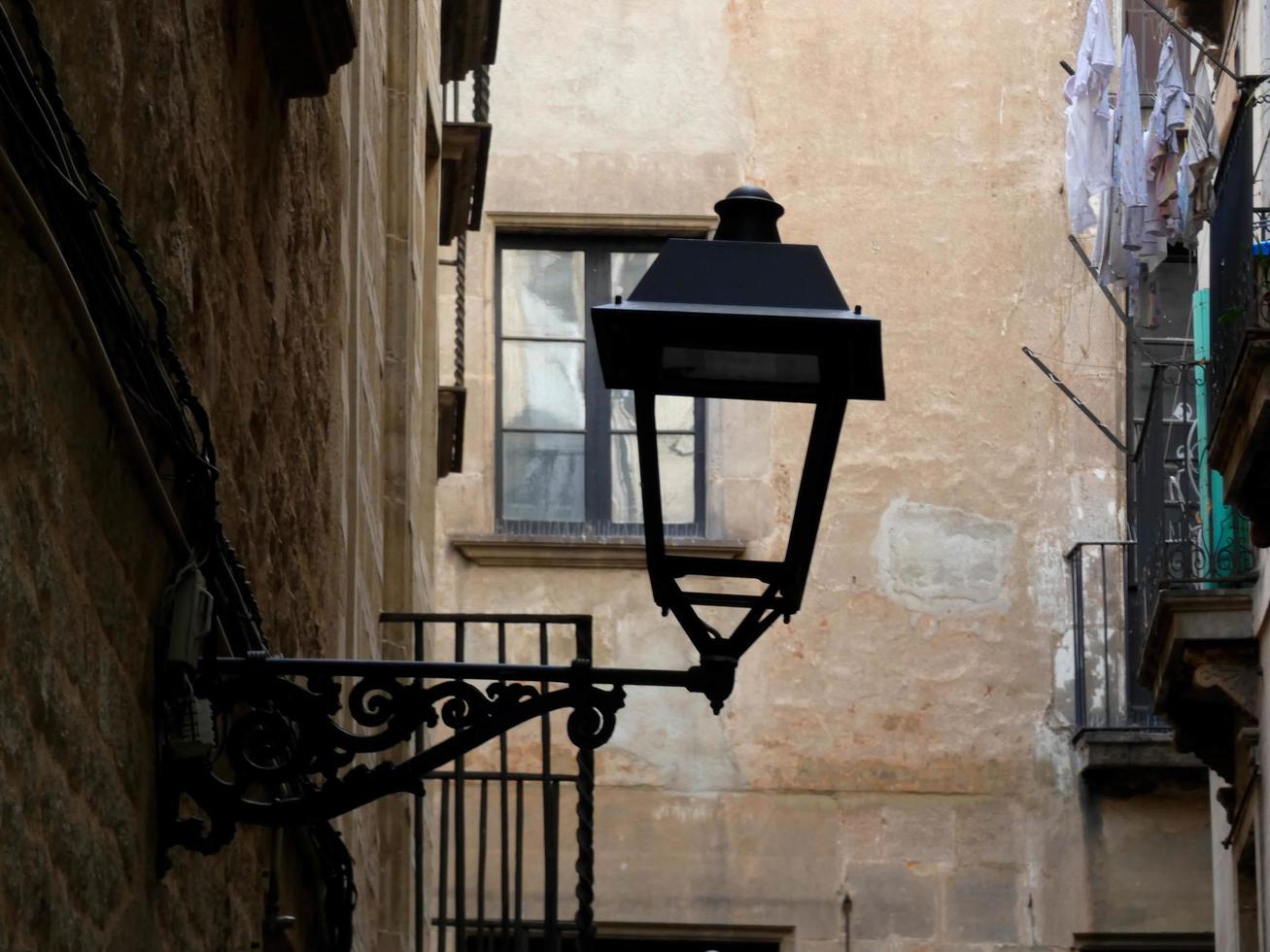 Classic street lamp in the gothic quarter of the city of Barcelona. photo