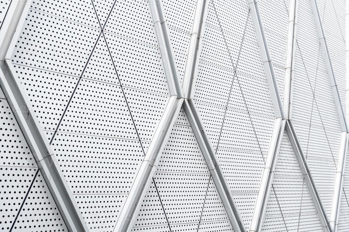 aluminium composite panels or cladding with perforated sheets on modern building facade, Abstract architecture background concept. photo