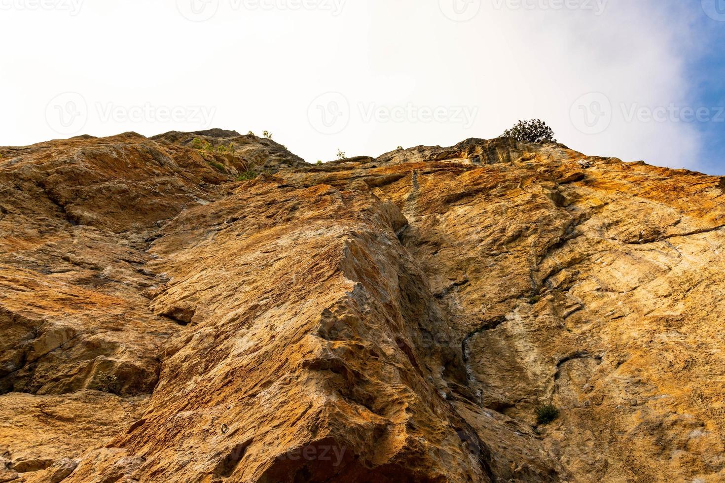 Red Red stone is a rock of pinkish-yellow marbled limestone. photo