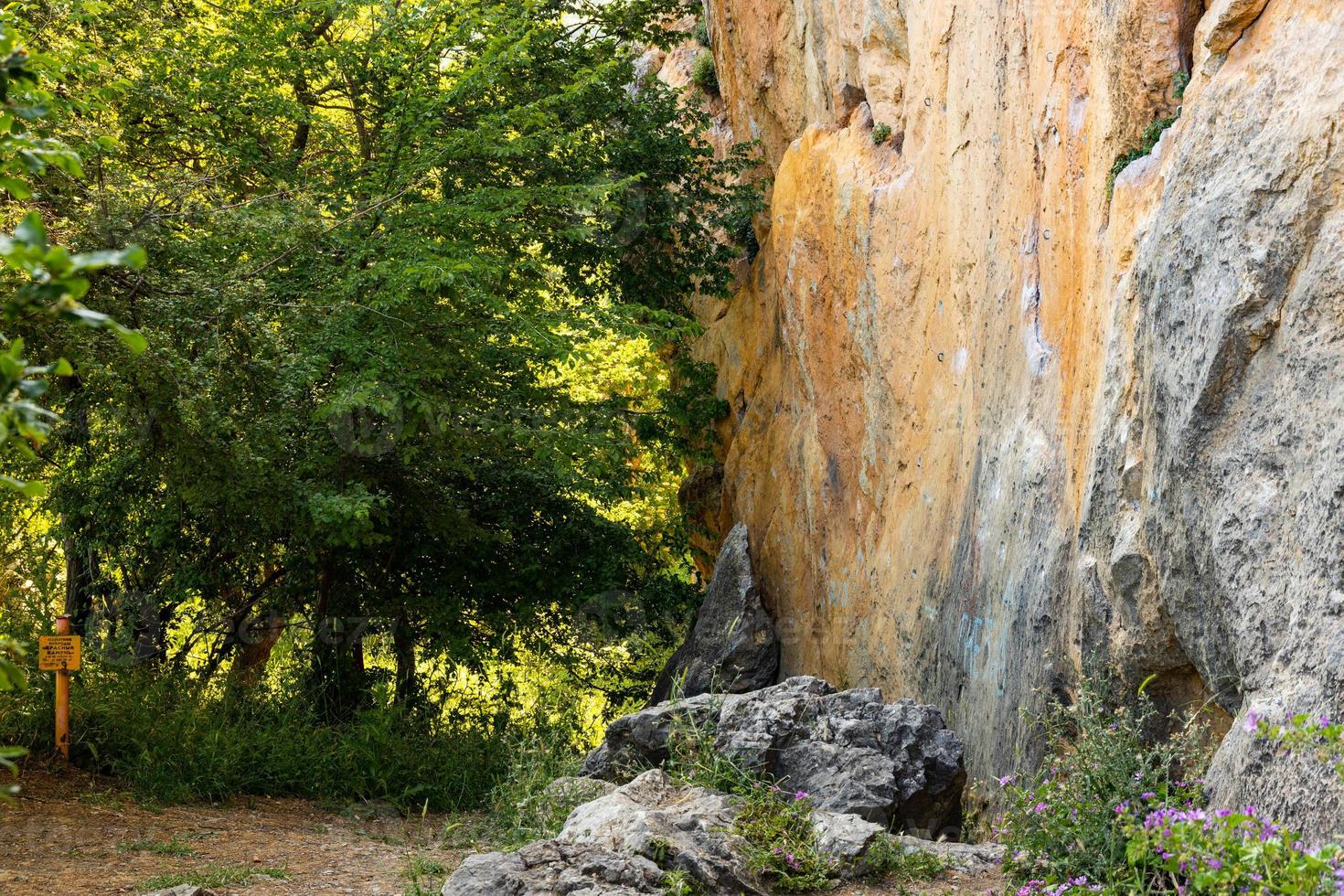 Red Red stone is a rock of pinkish-yellow marbled limestone. photo