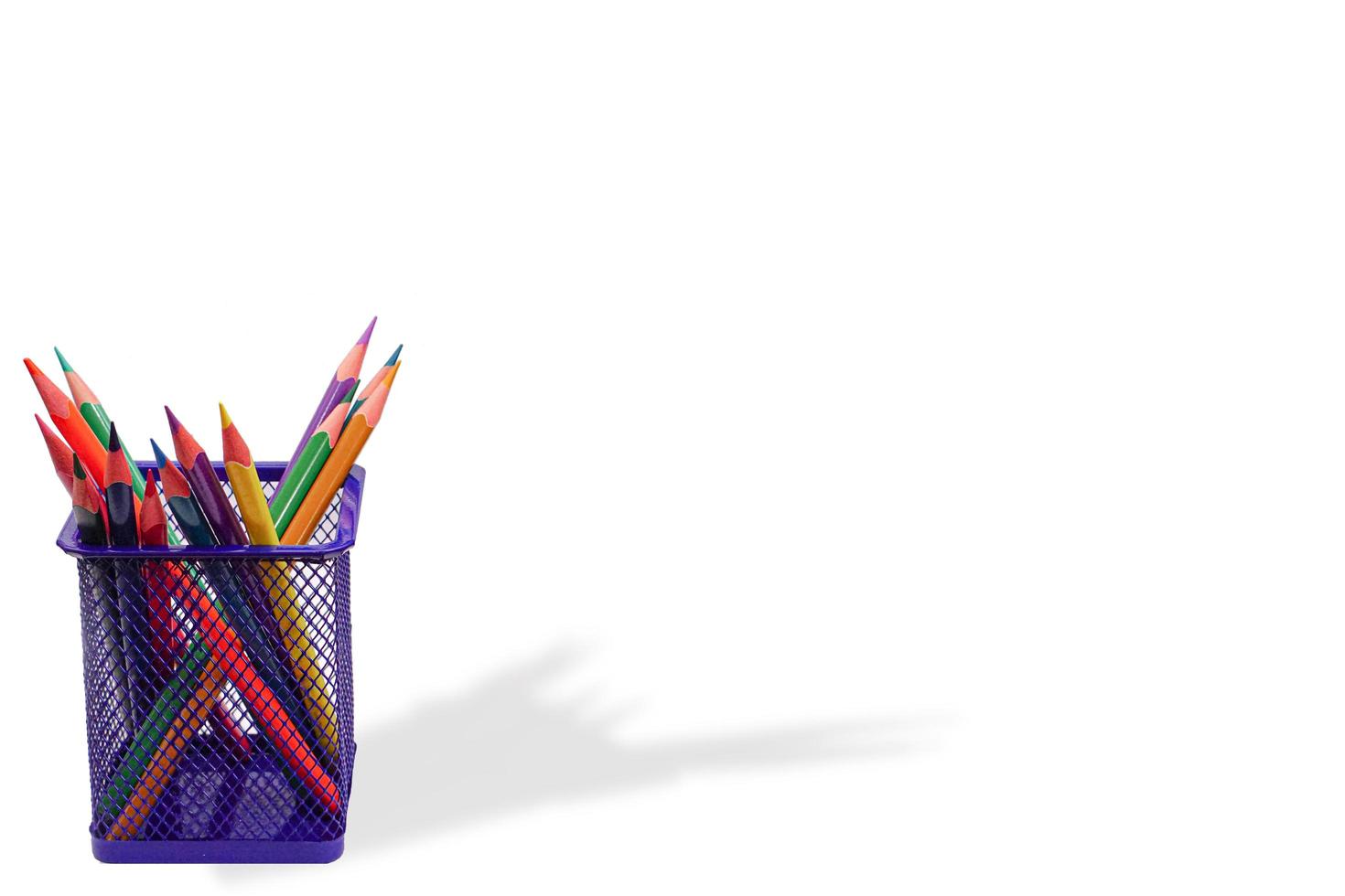 Image of colored pencils holder on white background. photo